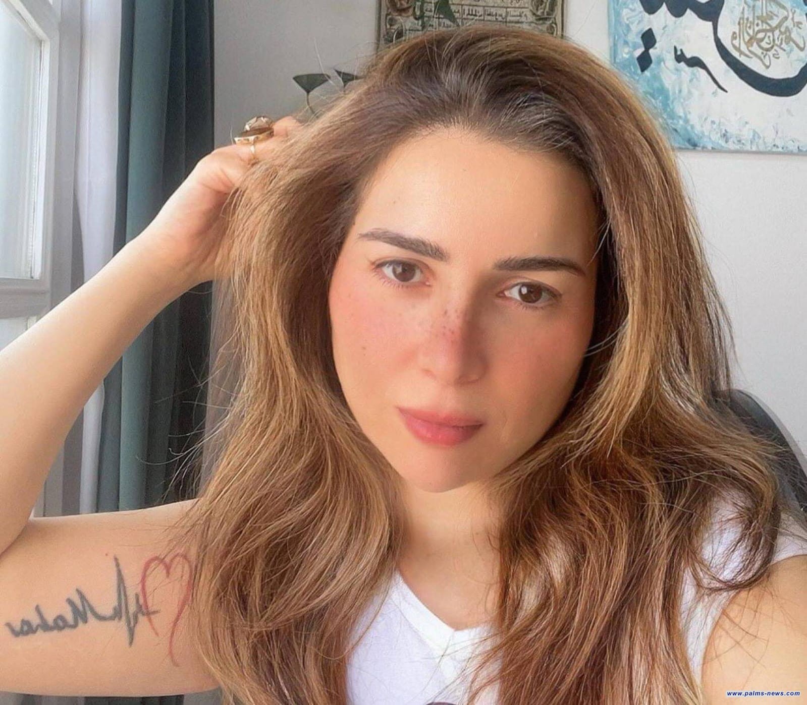 مي عز الدين تثير الجدل بعد نشرها  صورة لصفحة من القرآن الكريم